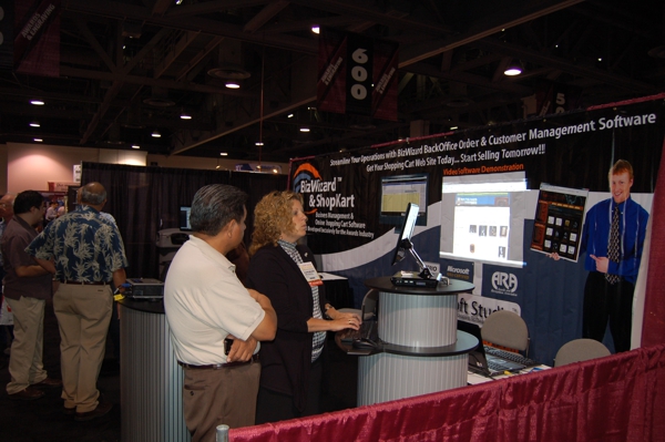 NBM Show in Long Beach, California 2010 Kami Arnold demonstrates the Awards Shopping Cart Software and BizWizard Order Manager software to prospective customers