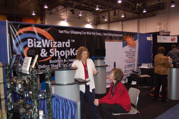 Sherry Grabil and Kami Arnold discuss BizWizard Order Manager™ and BizWizard ShopKart™ awards and trophy shopping cart software at the 2010 awards and trophy international tradeshow